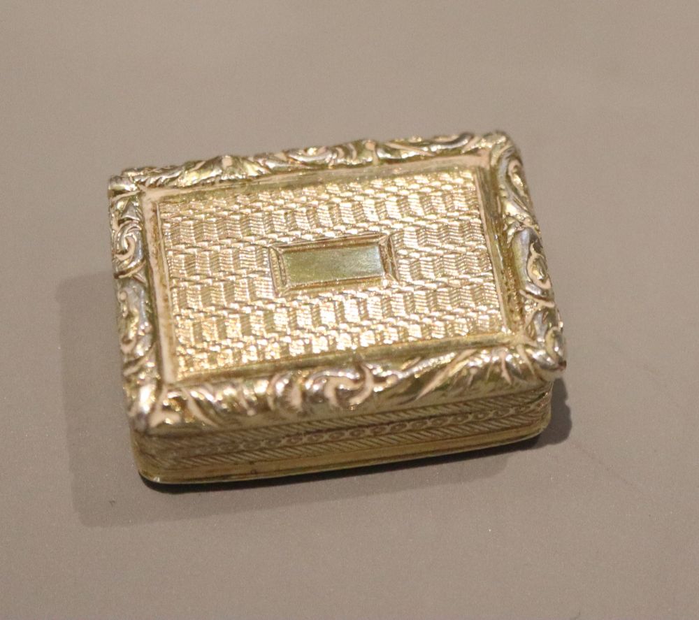 A George III silver gilt vinaigrette, William Simpson, Birmingham, 1826, 28mm.